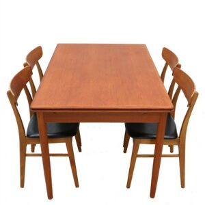 Mid century teak dining table with extensions / Danish modern design